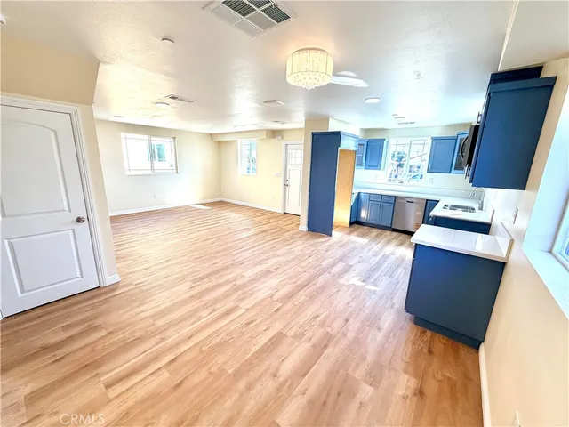 a view of livingroom with hardwood and furniture