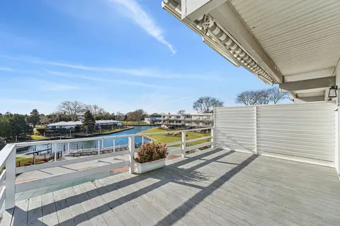 a view of a balcony with city view