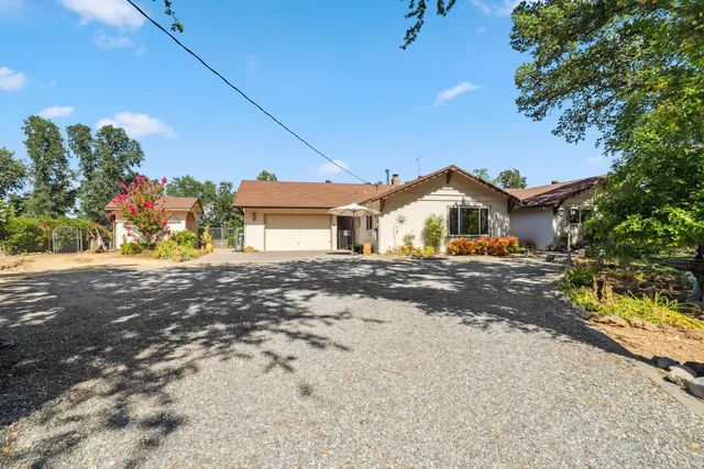 a view of large house with a road