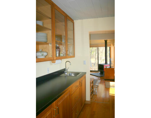 42 Willow Road Harvard, MA 01451 - Photo 10 of 26 a bathroom with a sink and a large mirror