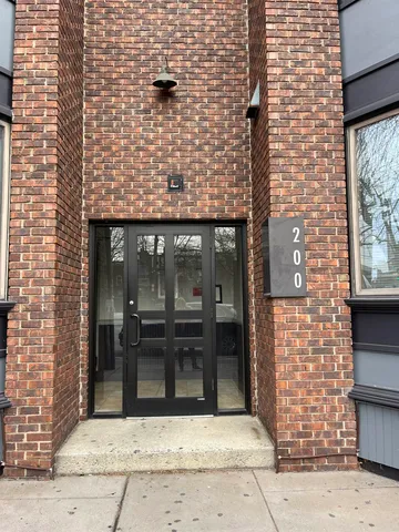 a view of a brick building with outdoor space