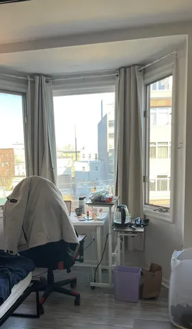 a room with furniture and a window