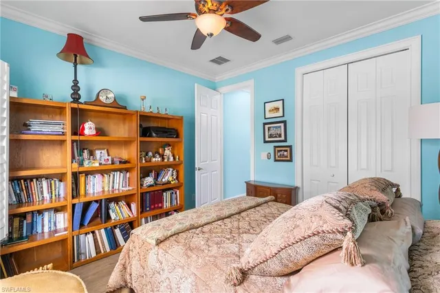 a bathroom with a double vanity sink mirror and toilet