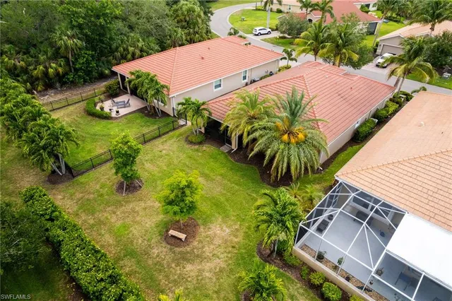 an aerial view of house with yard