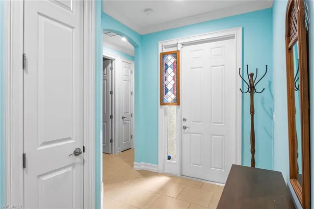 a view of room with windows and wardrobe