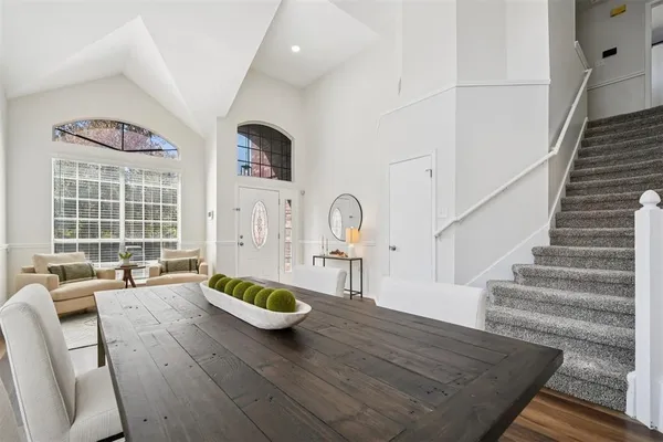 a living room with furniture and a table
