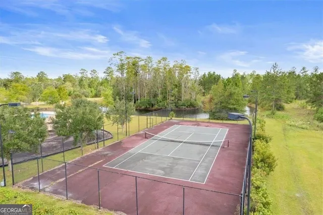 a view of a yard with an trees