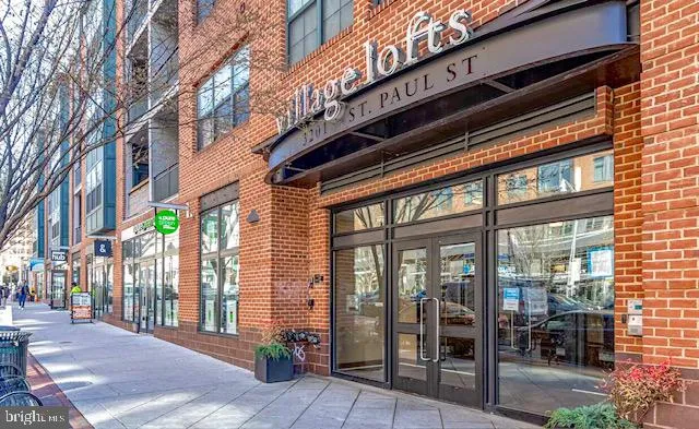 a front view of a building with street view