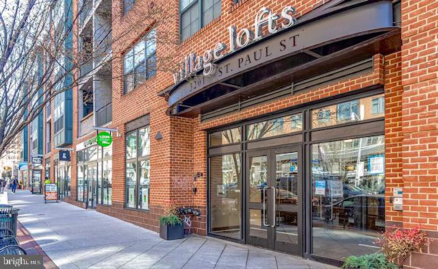 a front view of a building with street view