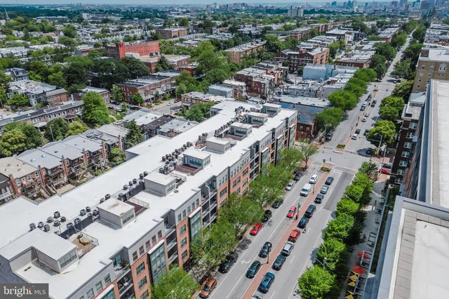an aerial view of a city with lots of residential buildings