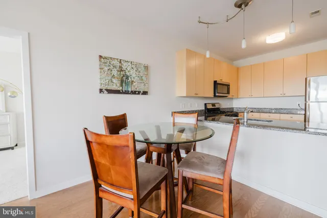 a view of a dining room with furniture