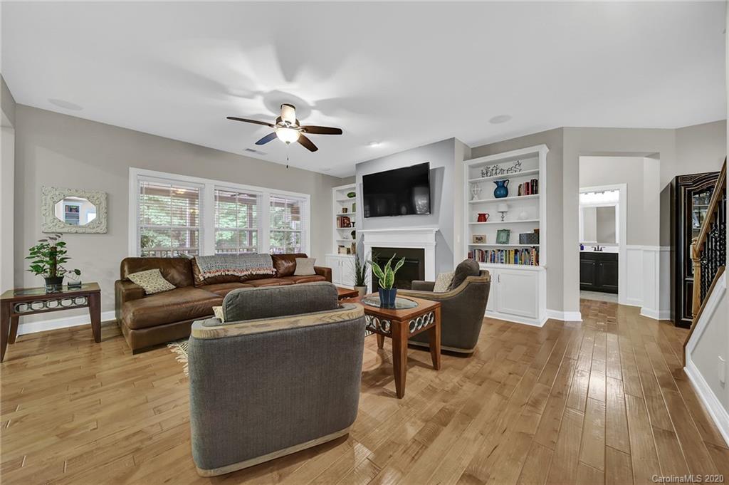 309 Calming Way Tega Cay, SC 29708 - Photo 12 of 41 a living room with furniture fireplace and a flat screen tv
