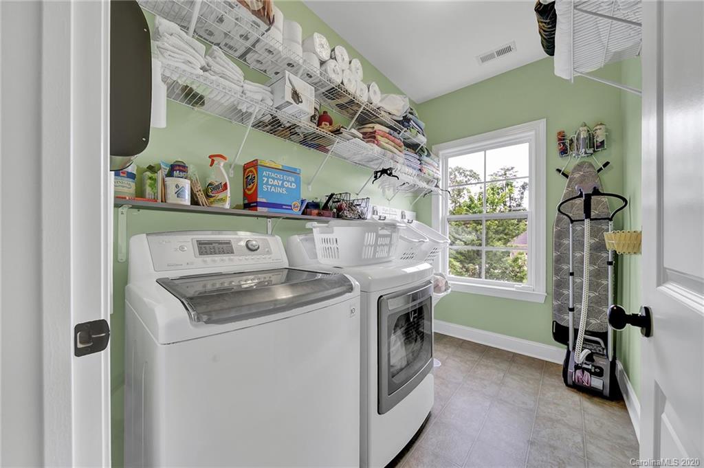 309 Calming Way Tega Cay, SC 29708 - Photo 30 of 41 a utility room with dryer and washer