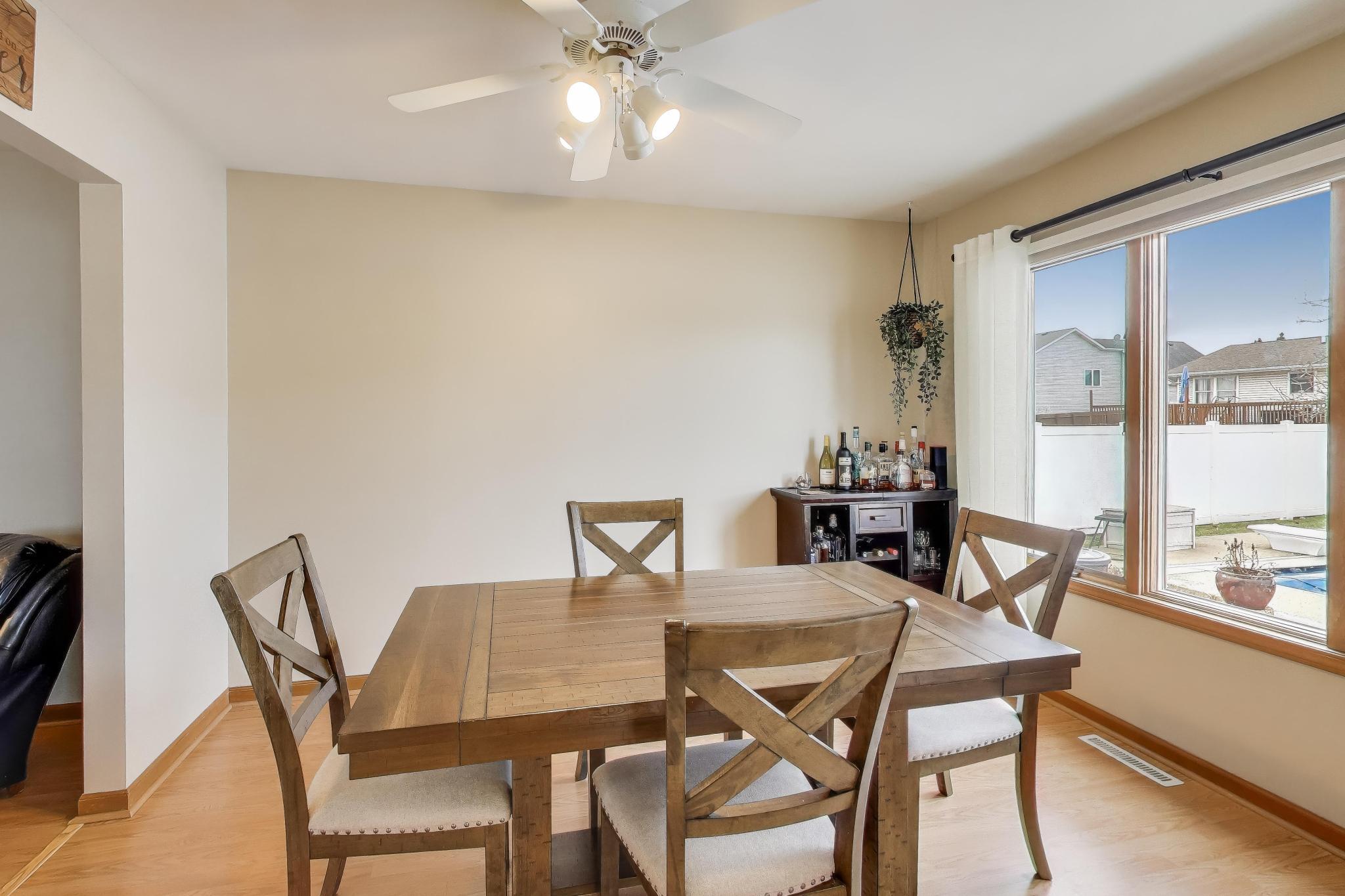 6926 Hawk Drive Schererville, IN 46375 - Photo 11 of 44 a dining room with furniture and window