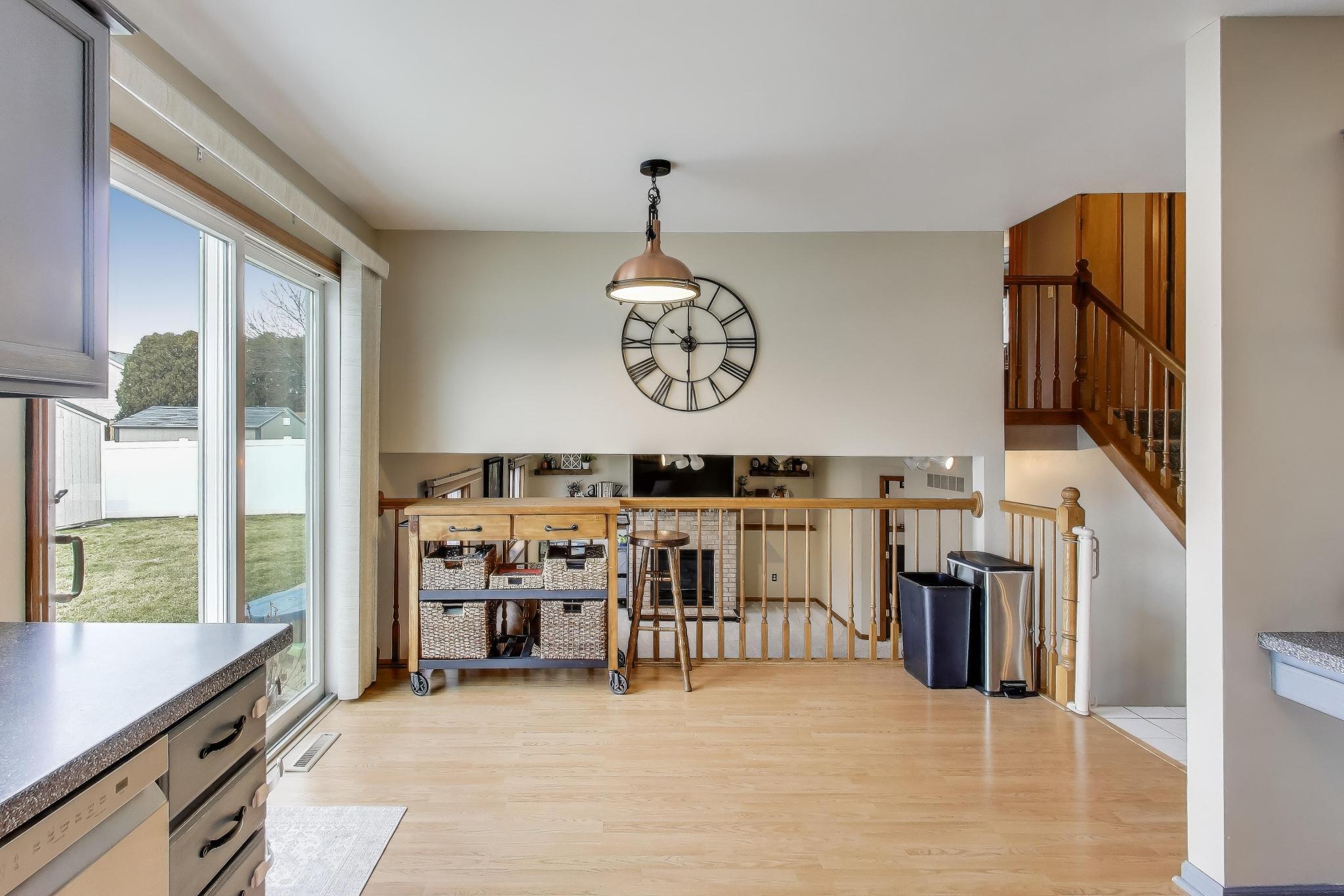 6926 Hawk Drive Schererville, IN 46375 - Photo 15 of 44 a view of a furniture and a fireplace in a room