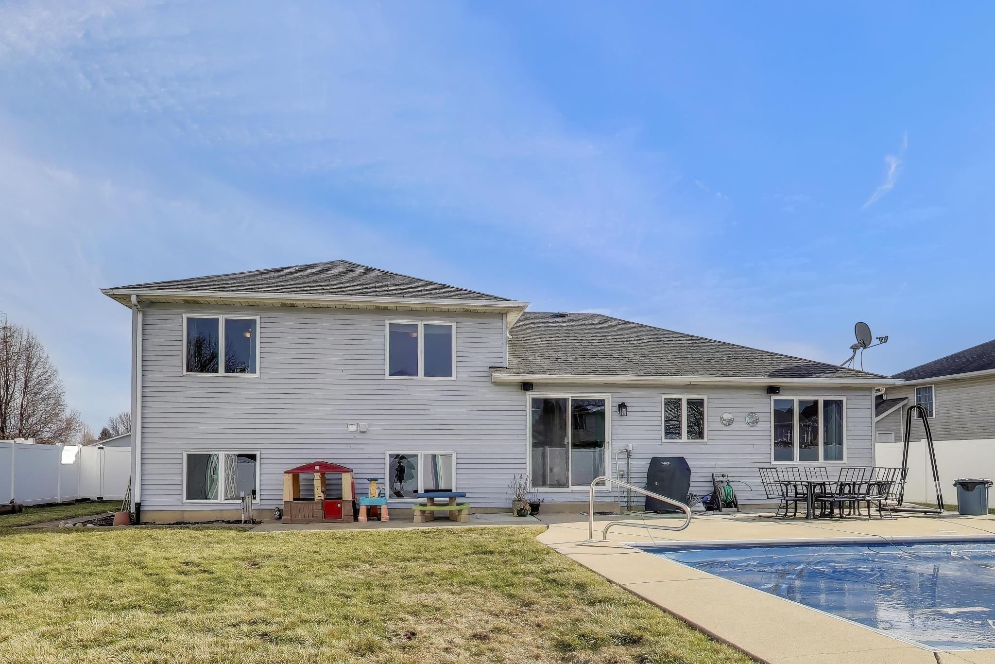6926 Hawk Drive Schererville, IN 46375 - Photo 34 of 44 a front view of a house with garden