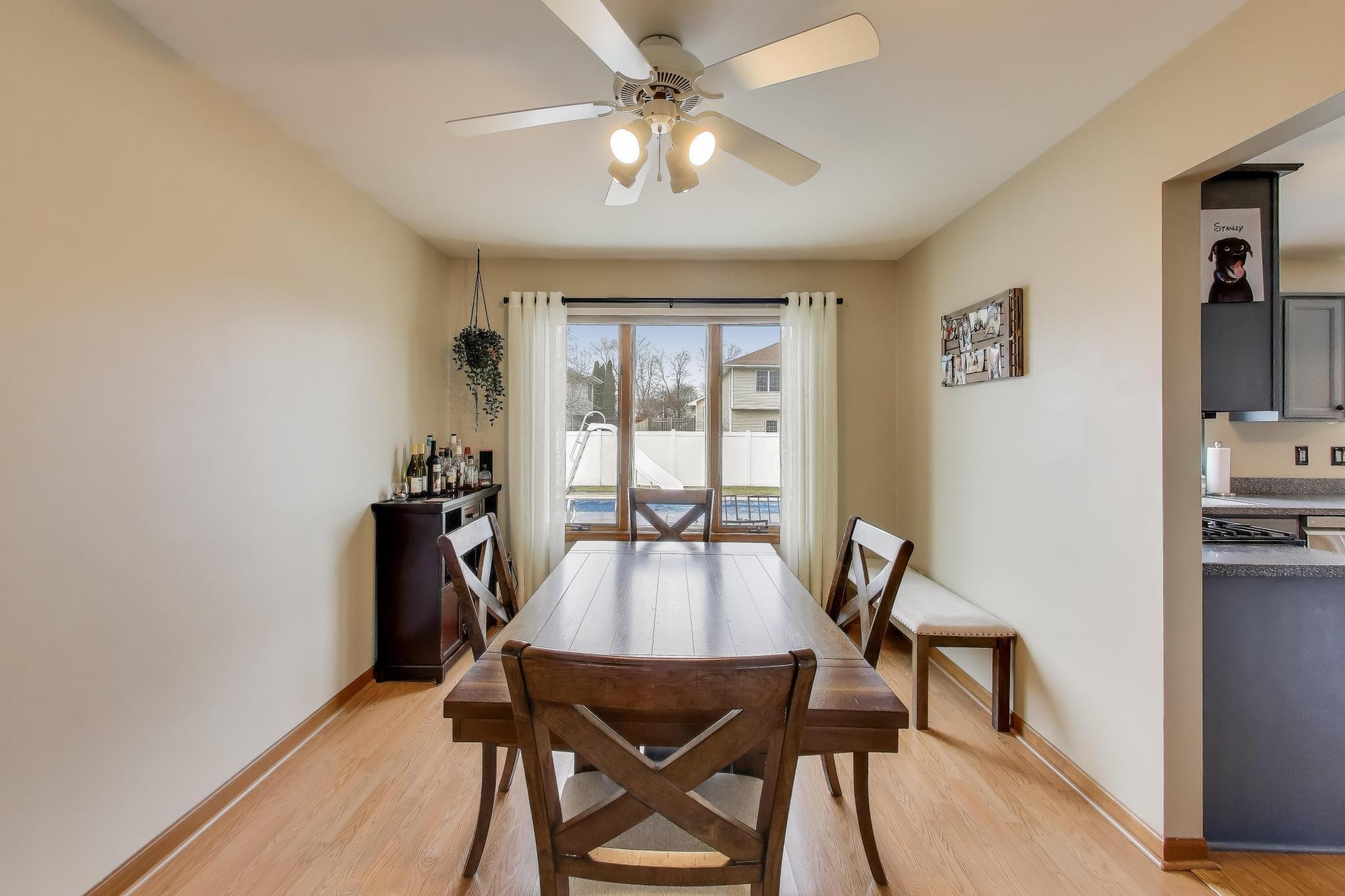 6926 Hawk Drive Schererville, IN 46375 - Photo 9 of 44 a dining room with furniture and window