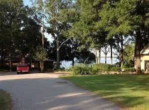 a view of road with trees