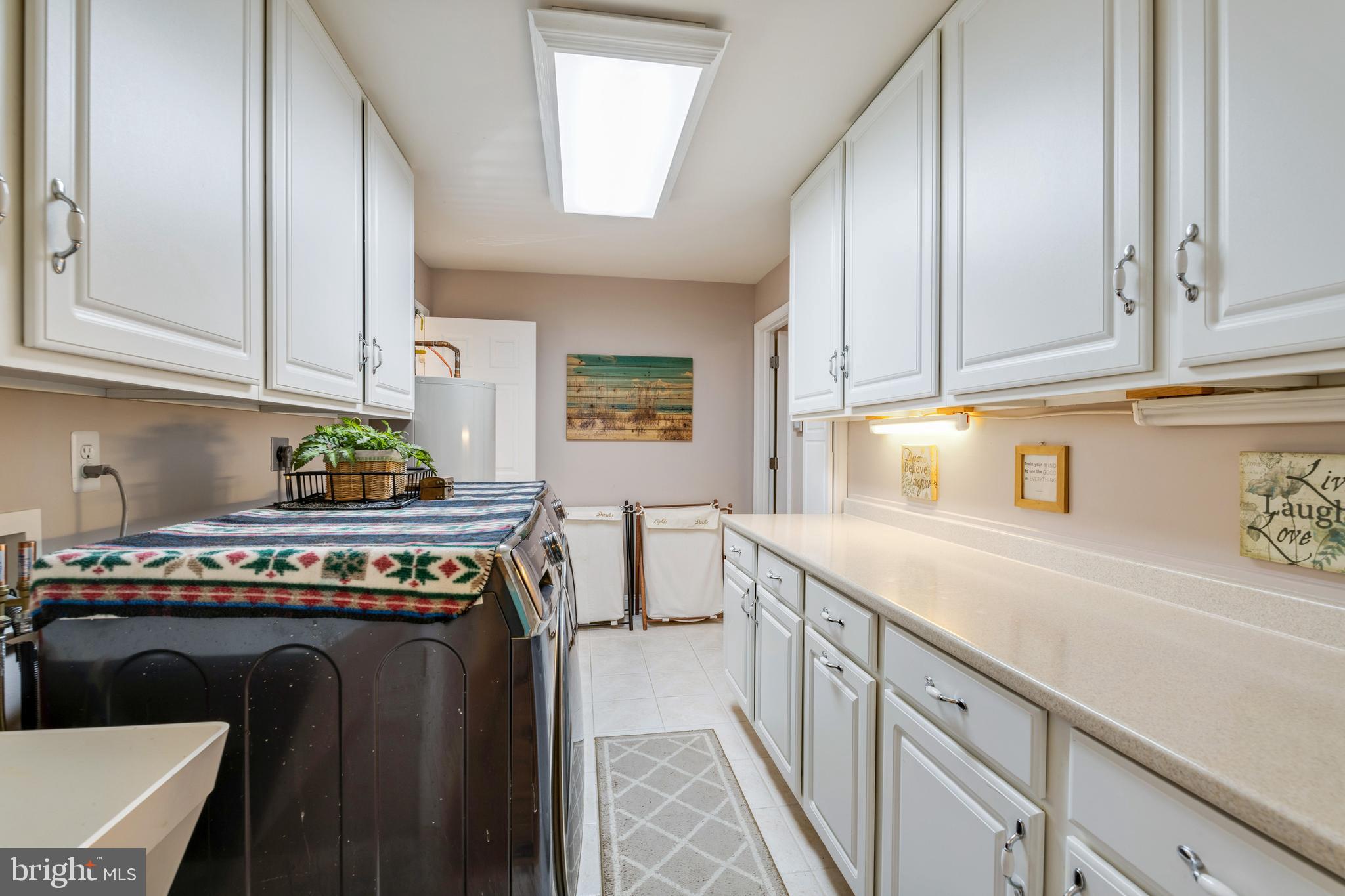 82 Johnson Road Pasadena, MD 21122 - Photo 21 of 76 Laundry Room - plenty of cabinets for storage