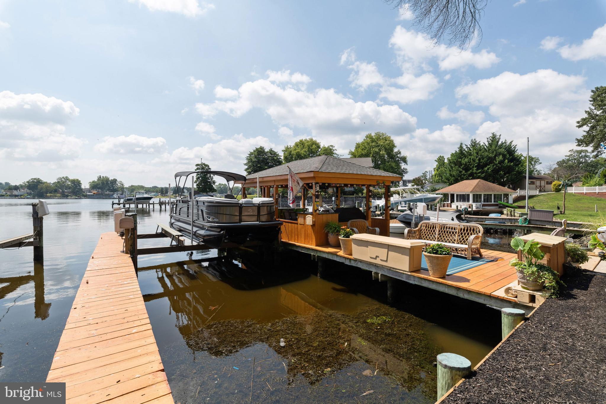 82 Johnson Road Pasadena, MD 21122 - Photo 57 of 76 Boat lift on pier