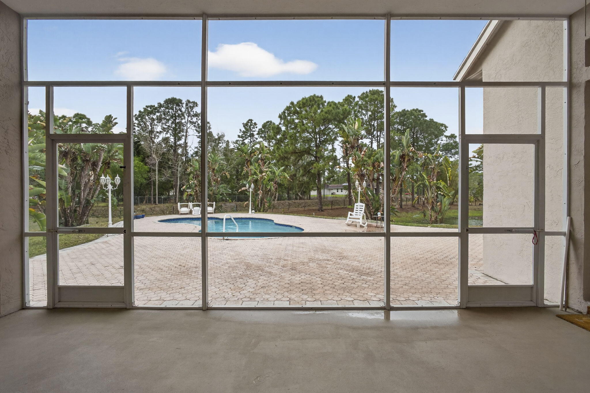 17044 72nd Road North Loxahatchee, FL 33470 - Photo 38 of 52 Screened Lanai