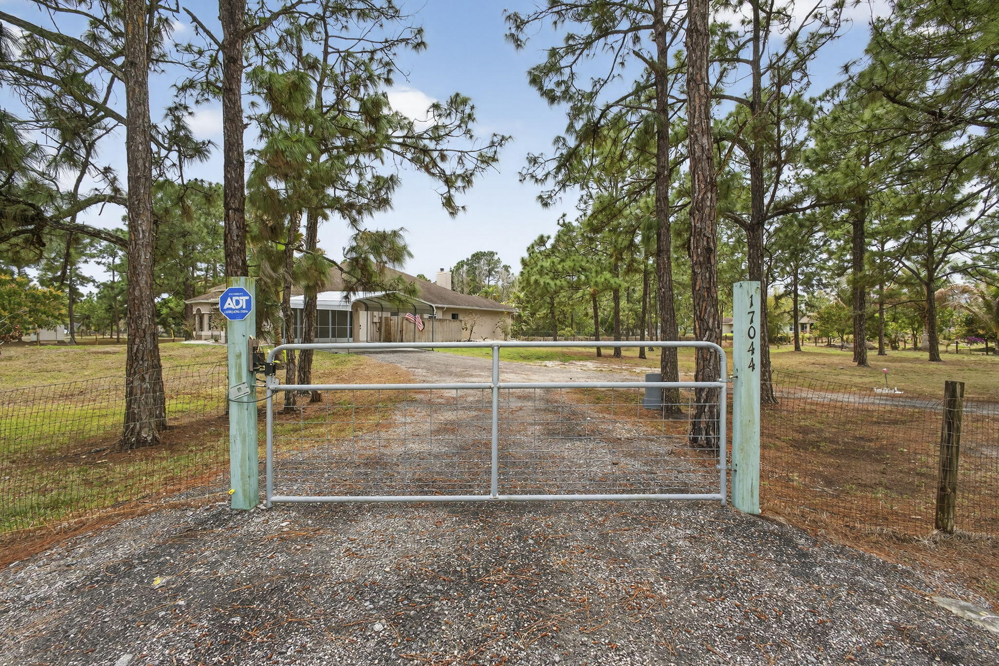 17044 72nd Road North Loxahatchee, FL 33470 - Photo 48 of 52 Gated Driveway