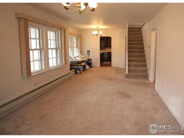 a view of livingroom with furniture and a window
