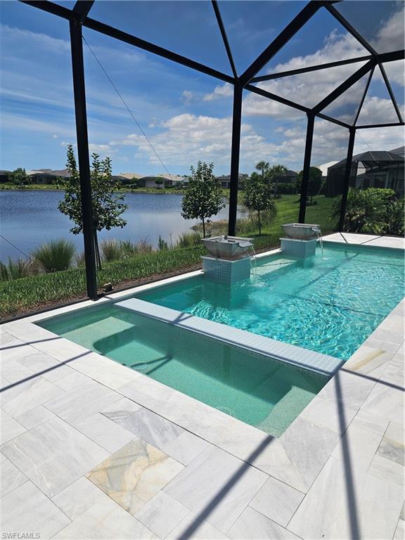 9022 Redonda Drive Naples, FL 34114 - Photo 17 of 28 a view of a patio with a table chairs and a yard