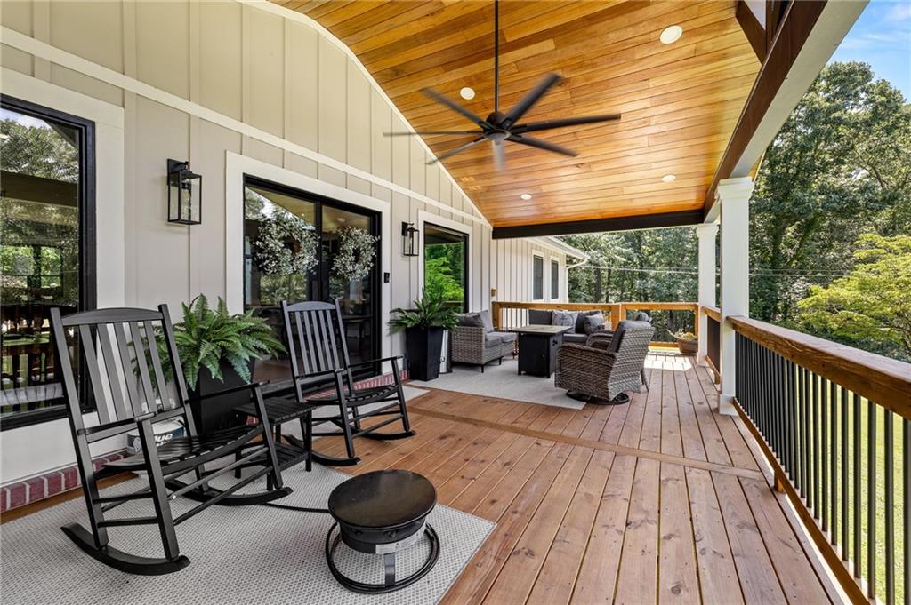6470 Samoa Way Flowery Branch, GA 30542 - Photo 7 of 61 a building outdoor space with patio furniture and potted plants