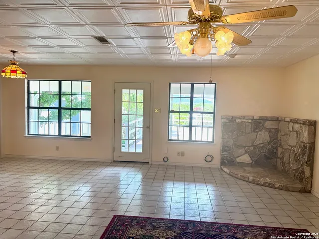 a view of an empty room and window