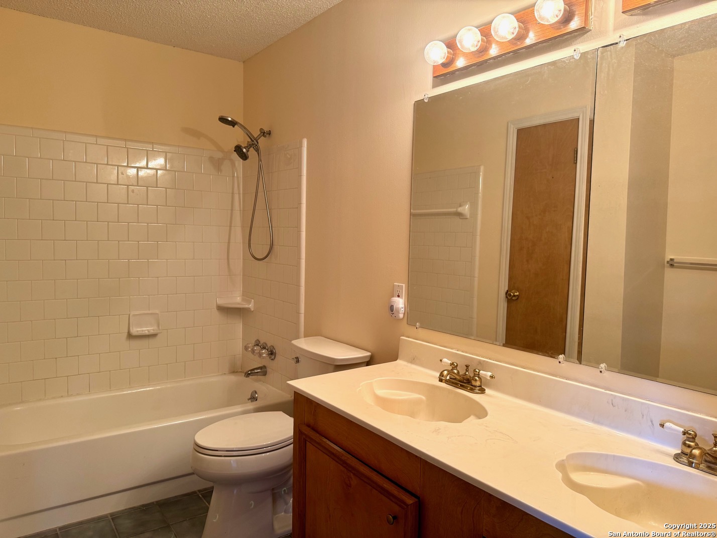 181 Leinweber Drive Leakey, TX 78873 - Photo 21 of 56 a bathroom with a sink a toilet and shower