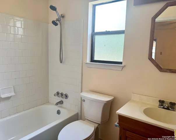 a view of a balcony with wooden floor
