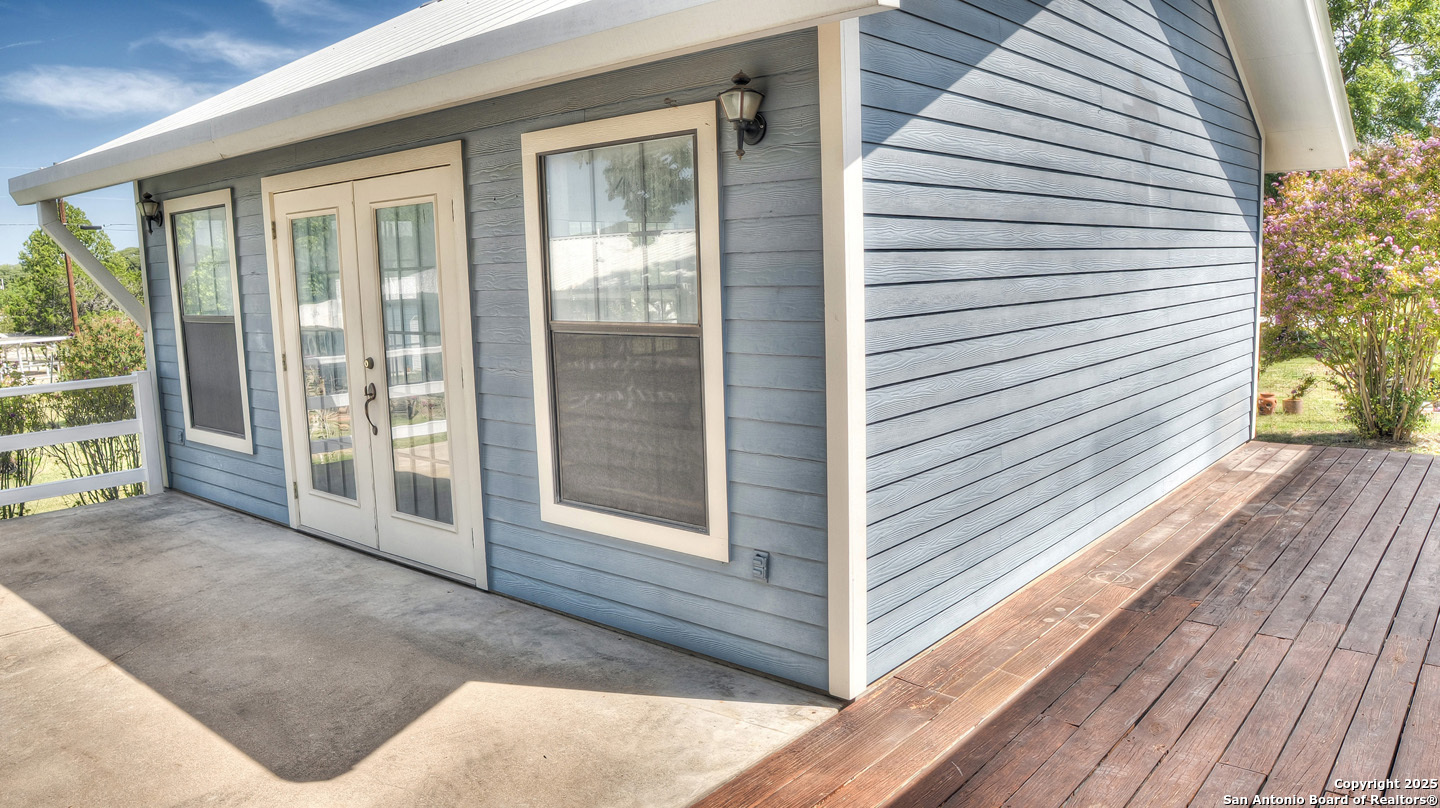 181 Leinweber Drive Leakey, TX 78873 - Photo 26 of 56 a view of a balcony with wooden floor