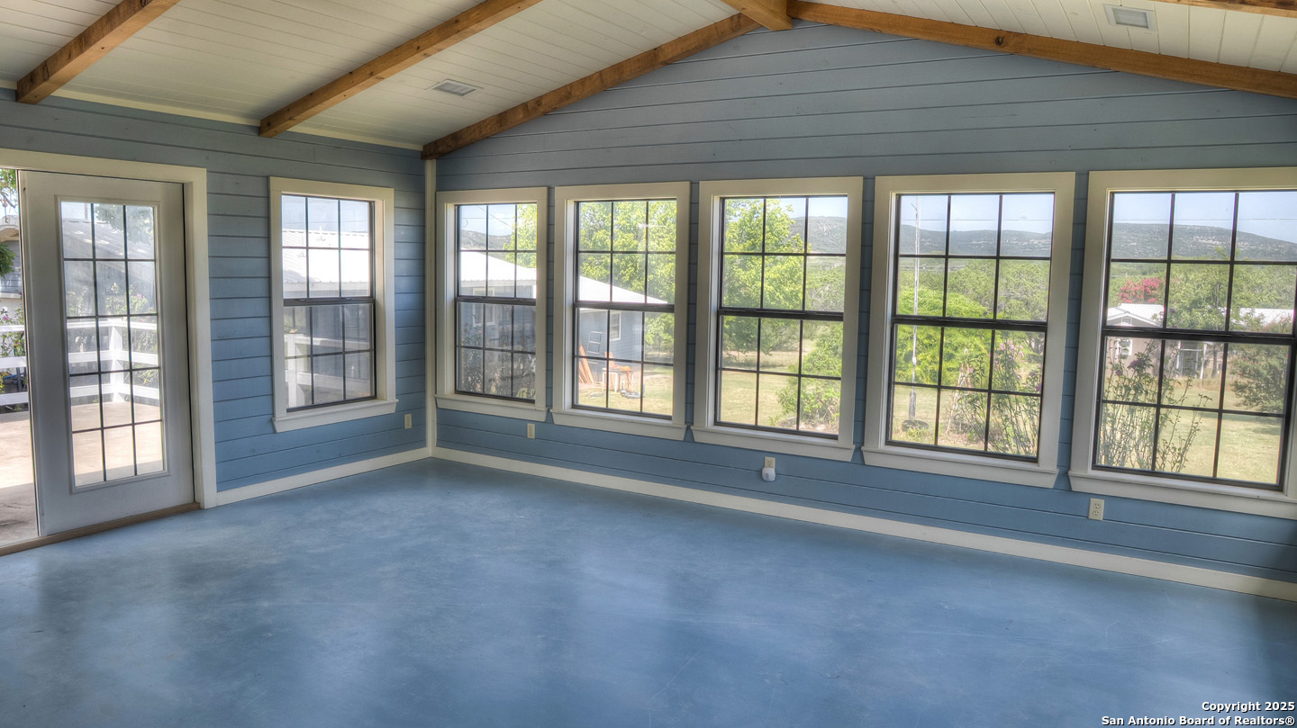 181 Leinweber Drive Leakey, TX 78873 - Photo 30 of 56 a view of an empty room with a large window