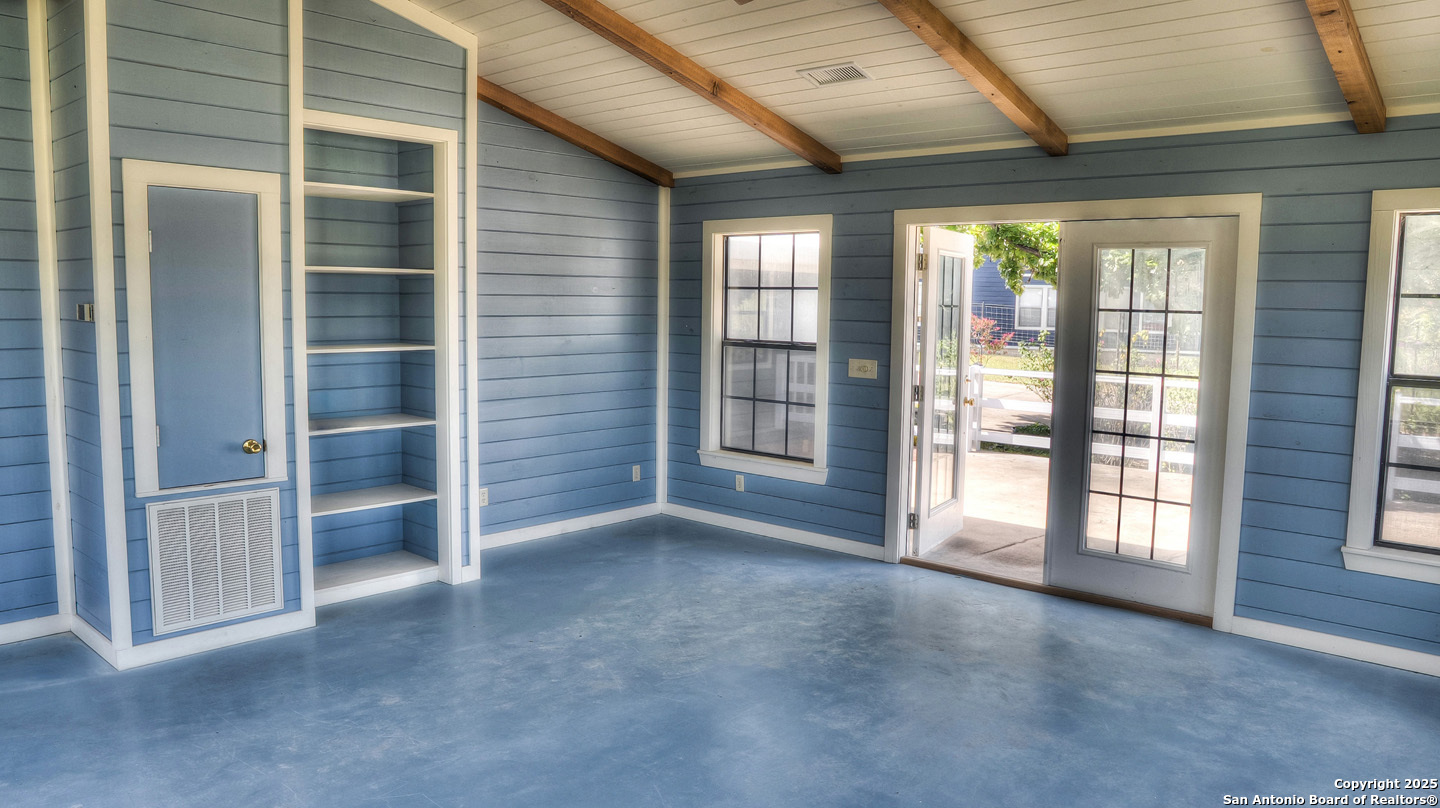 181 Leinweber Drive Leakey, TX 78873 - Photo 31 of 56 a view of an empty room with a window