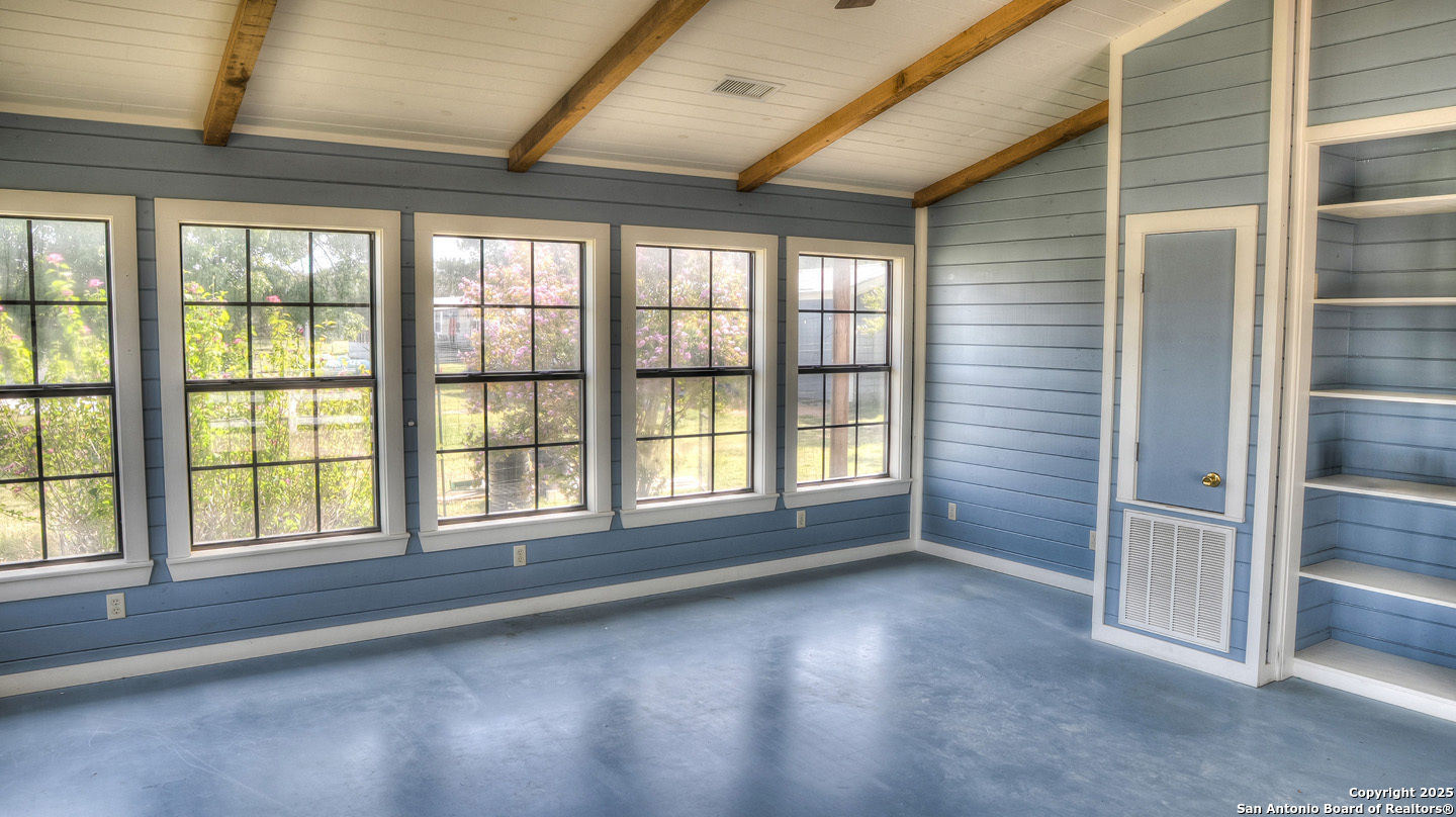 181 Leinweber Drive Leakey, TX 78873 - Photo 32 of 56 an empty room with windows