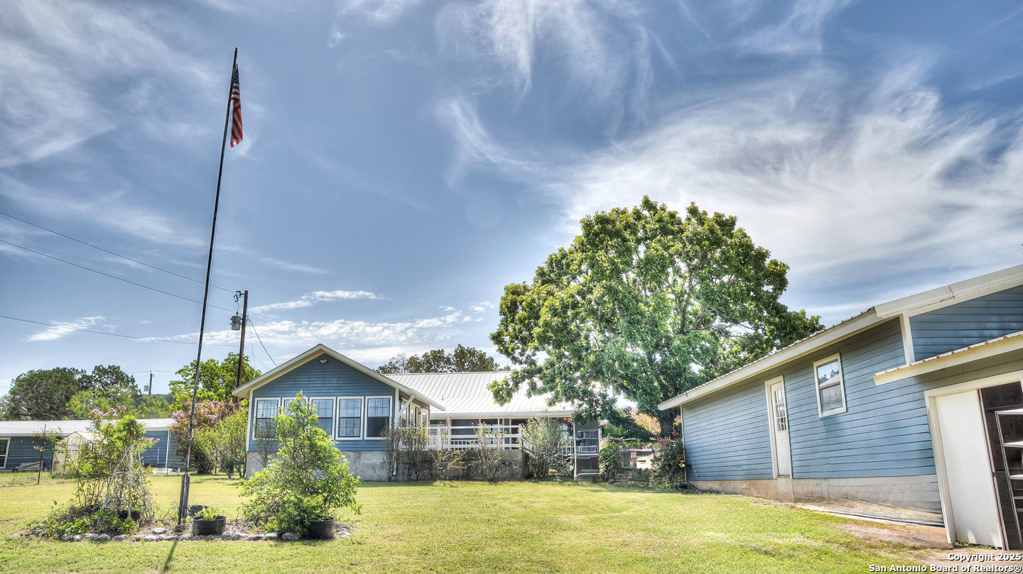 181 Leinweber Drive Leakey, TX 78873 - Photo 36 of 56 a front view of a house with a yard