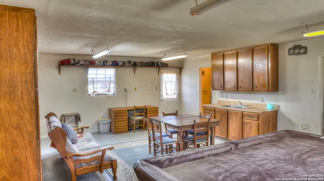 a bathroom with a shower and a shower curtain