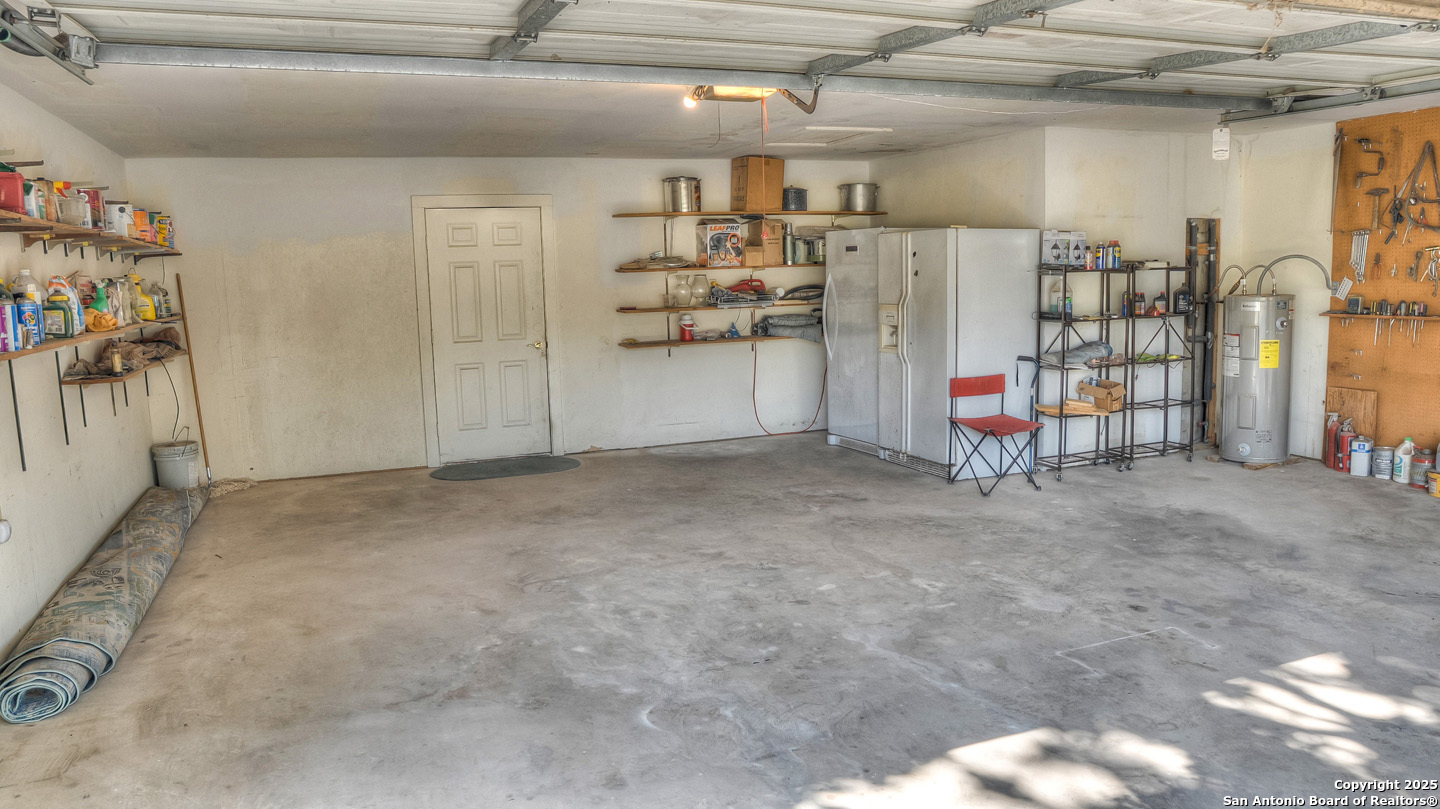 181 Leinweber Drive Leakey, TX 78873 - Photo 42 of 56 a view of storage and utility room