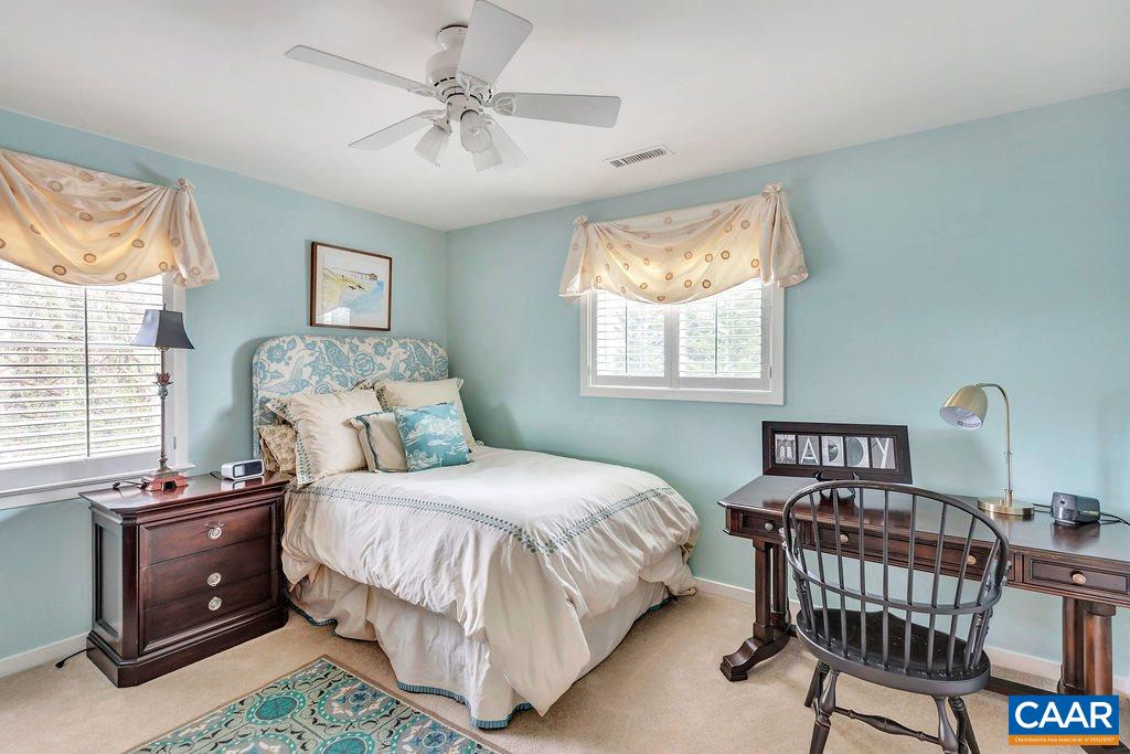 1556 Dairy Road Charlottesville, VA 22903 - Photo 28 of 43 a bedroom with a bed and a window