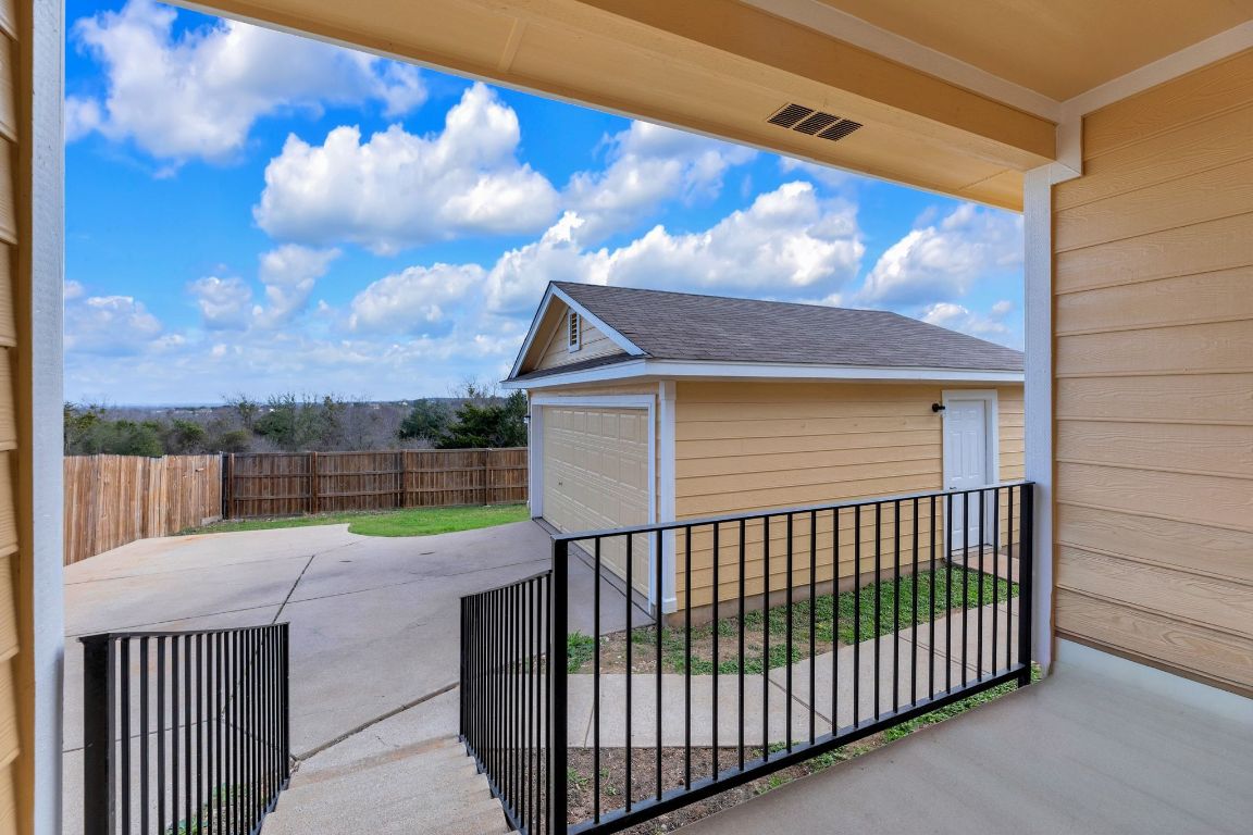 11617 Briarcreek Loop Manor, TX 78653 - Photo 30 of 37 View of patio / terrace featuring an outdoor structure and a garage