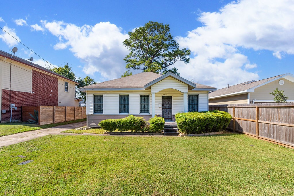 5822 Grace Lane Houston, TX 77021 - Photo 1 of 7 a front view of a house with garden