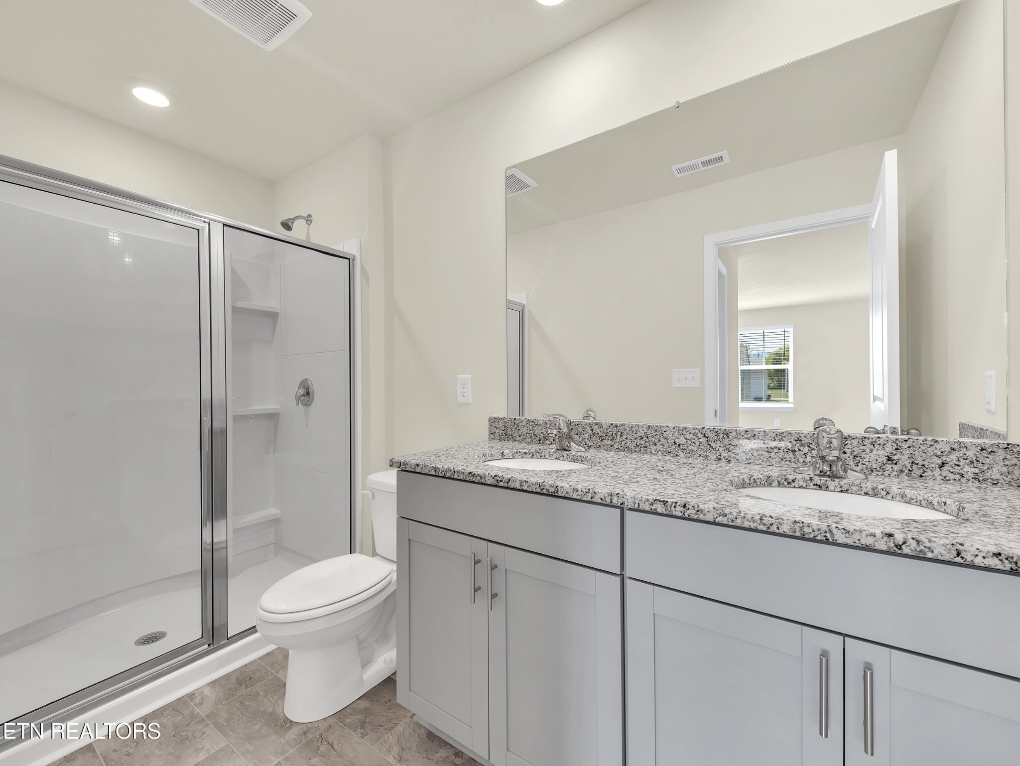 3521 Rylee Jean Way Maryville, TN 37804 - Photo 12 of 20 a bathroom with a granite countertop sink toilet and shower