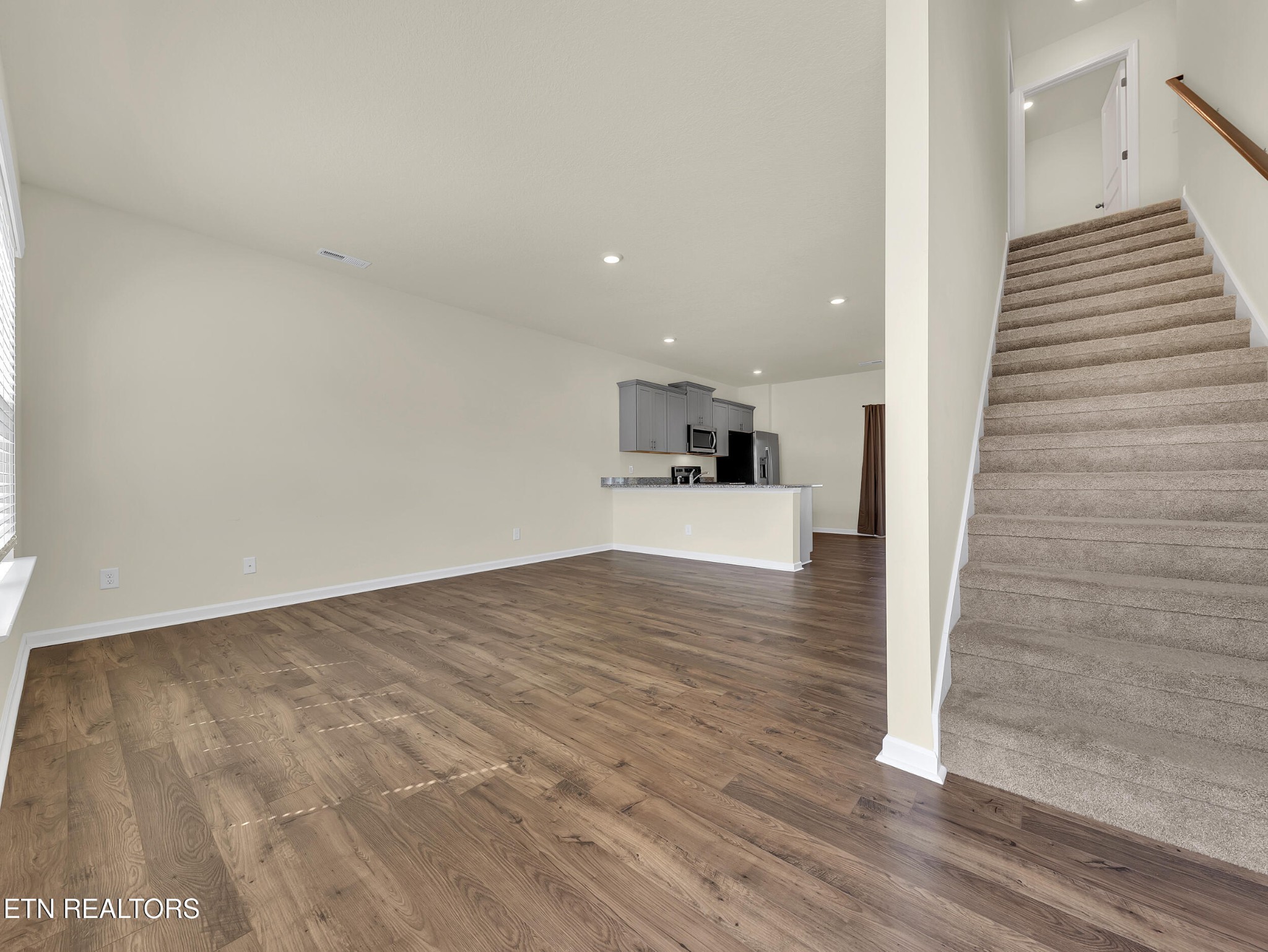 3521 Rylee Jean Way Maryville, TN 37804 - Photo 3 of 20 a view of a kitchen with wooden floor and electronic appliances