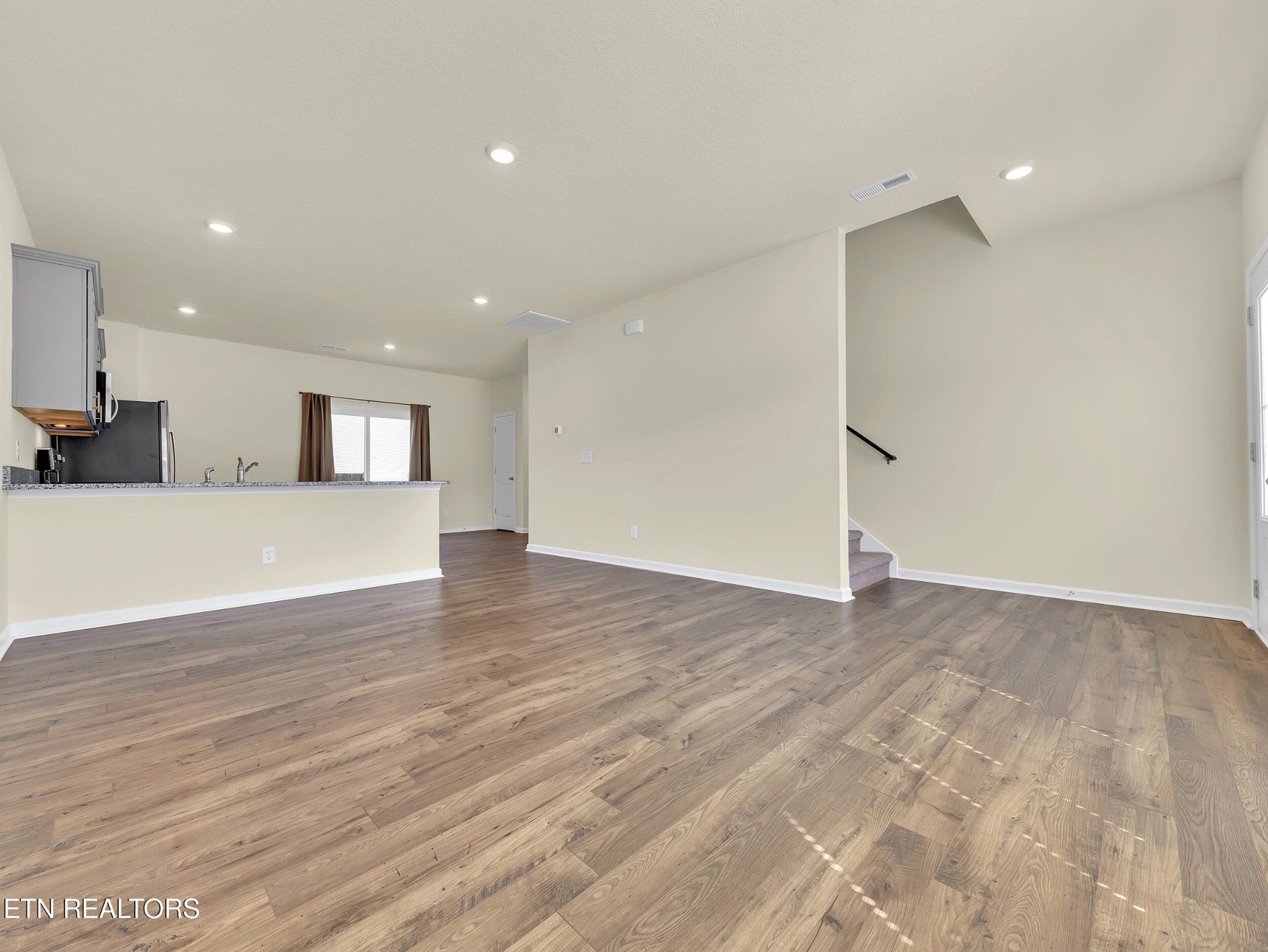 3521 Rylee Jean Way Maryville, TN 37804 - Photo 4 of 20 a view of a kitchen with a sink and a large window