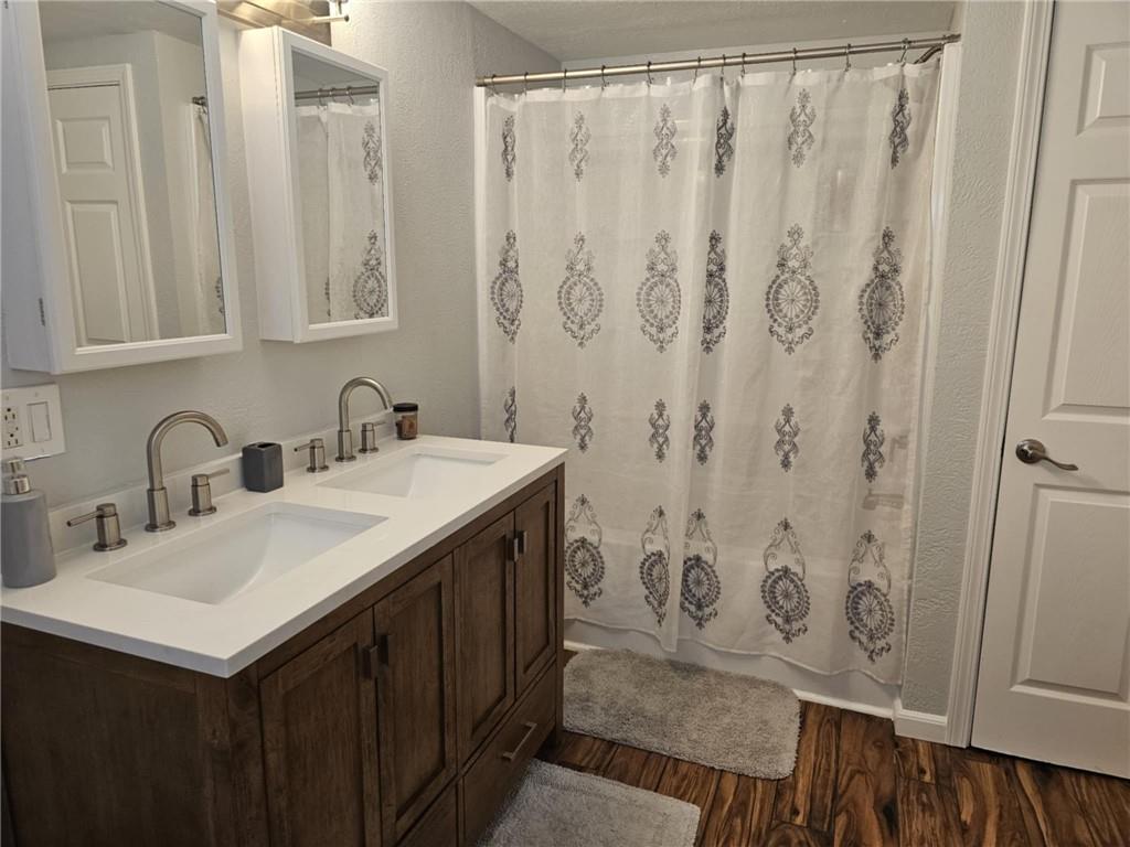 110 Post Road Uniontown, PA 15401 - Photo 9 of 17 a bathroom with a sink and a mirror