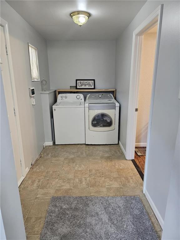 110 Post Road Uniontown, PA 15401 - Photo 10 of 17 a utility room with dryer and washer