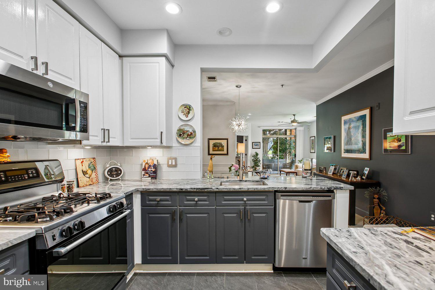 1855 Stratford Park Place, Unit 103 Reston, VA 20190 - Photo 10 of 49 A bright & light kitchen.