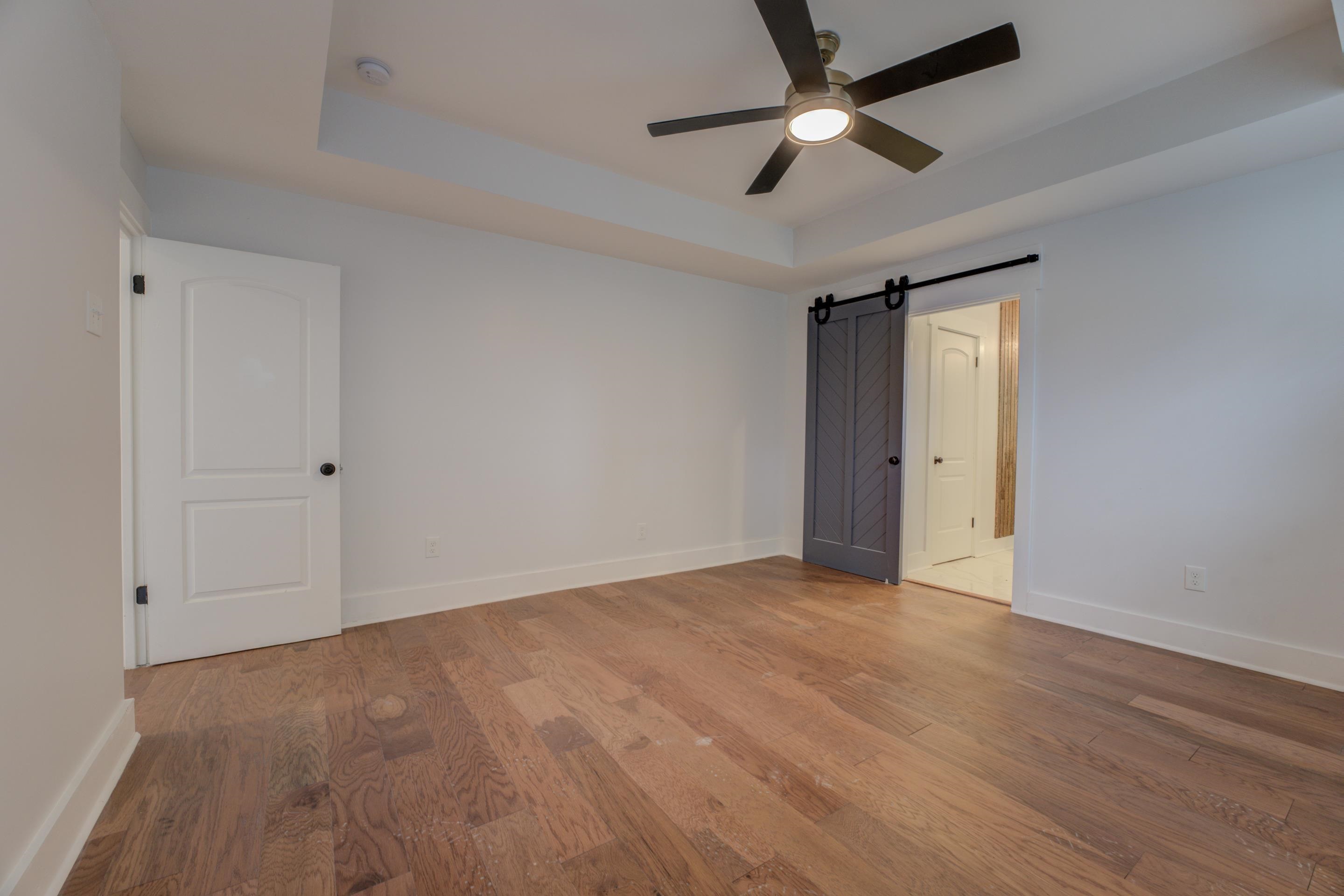 857 E Parkway South Memphis, TN 38104 - Photo 23 of 30 a view of an empty room and chandelier fan