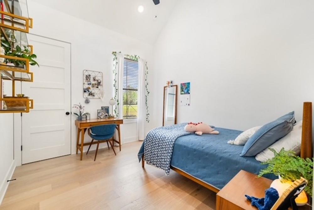 21197 Gatlinburg Road Bullard, TX 75757 - Photo 26 of 40 a bedroom with furniture and a potted plant